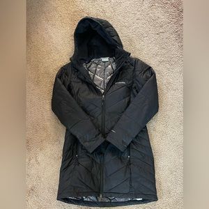 Lightweight and warm Columbia jacket. Some wear on the sleeves. Dulled color.